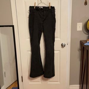 Faded black flare jeans. Size 13, wear size 11.
